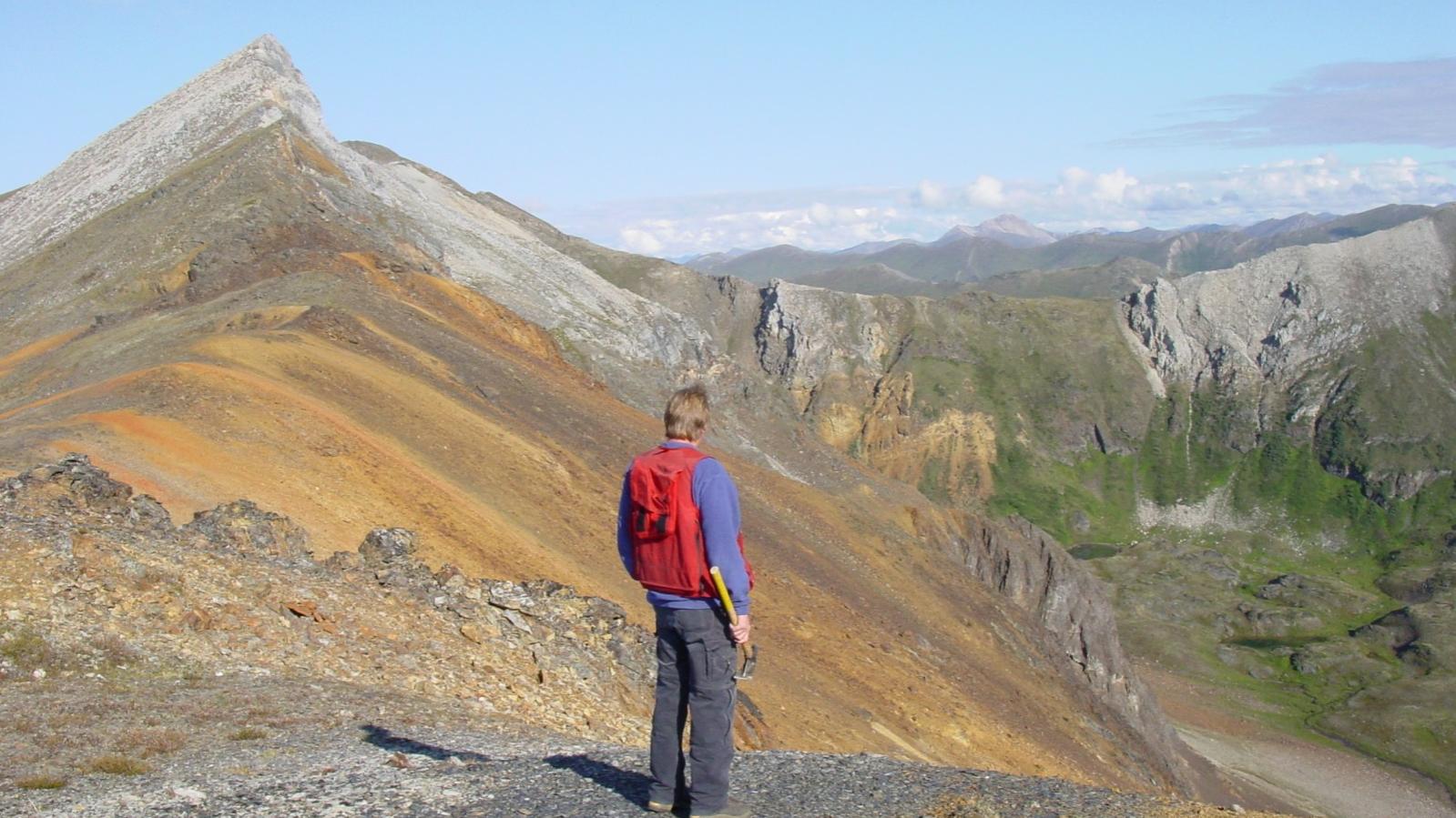 Gossanous ridge (Trachyte Dome with mineralized volcanic breccia) at the MM property