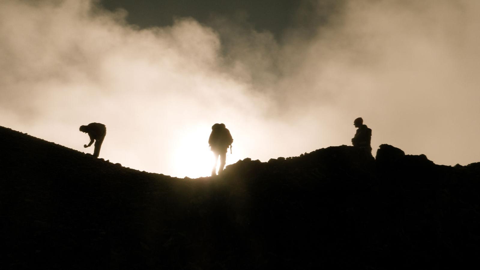 Exploration Geologists in the Field - Kalum Property - Hat Zone - Sampling on a misty ridge