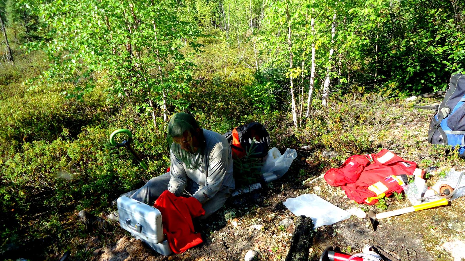 Collecting radon samples in northern Saskatchewan