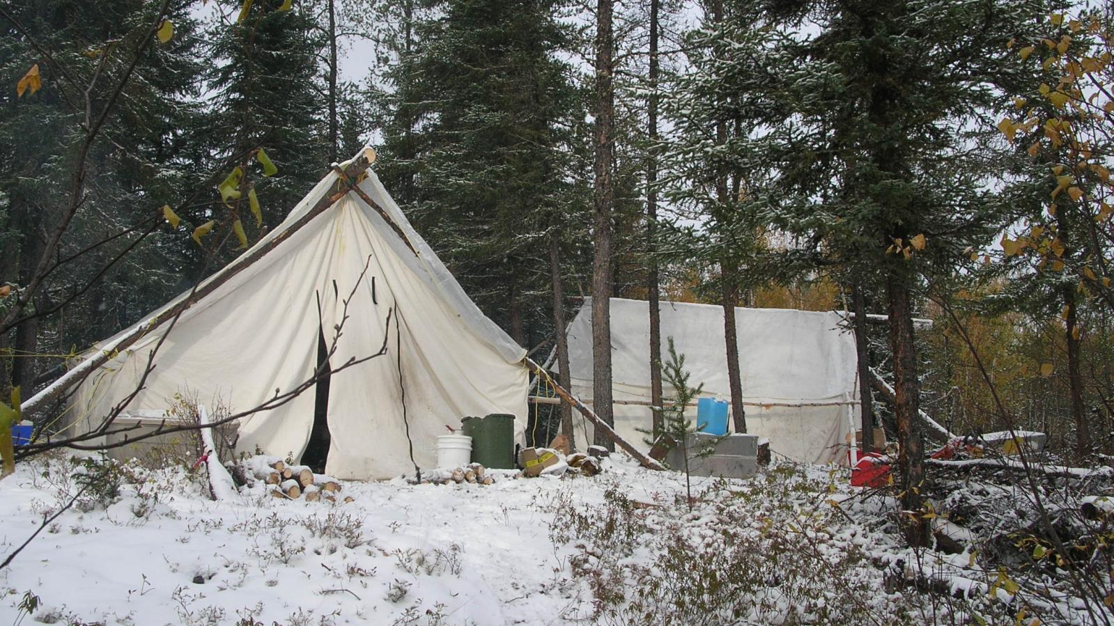 Wall tent exploration camp in winter in Saskatchewan 