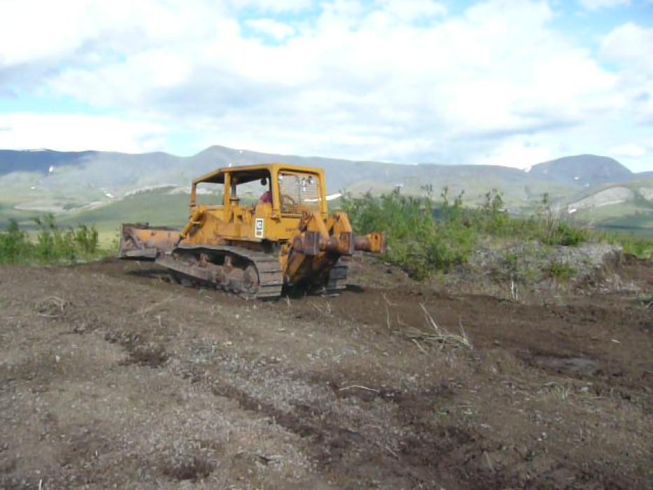 Regrading an Airstrip wtih a Caterpillar at the Rusty Springs Critical Metals Exploration Project in the Yukon