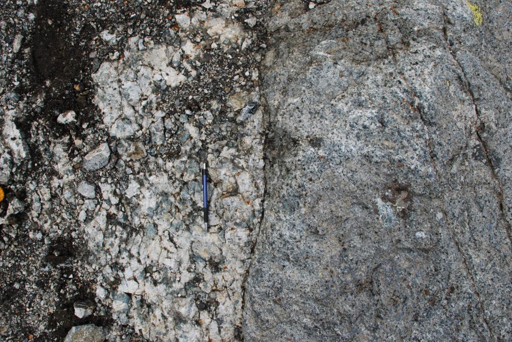 Contact of pegmatite syenite and coarse grained syenite in the Ice River Intrusive Complex