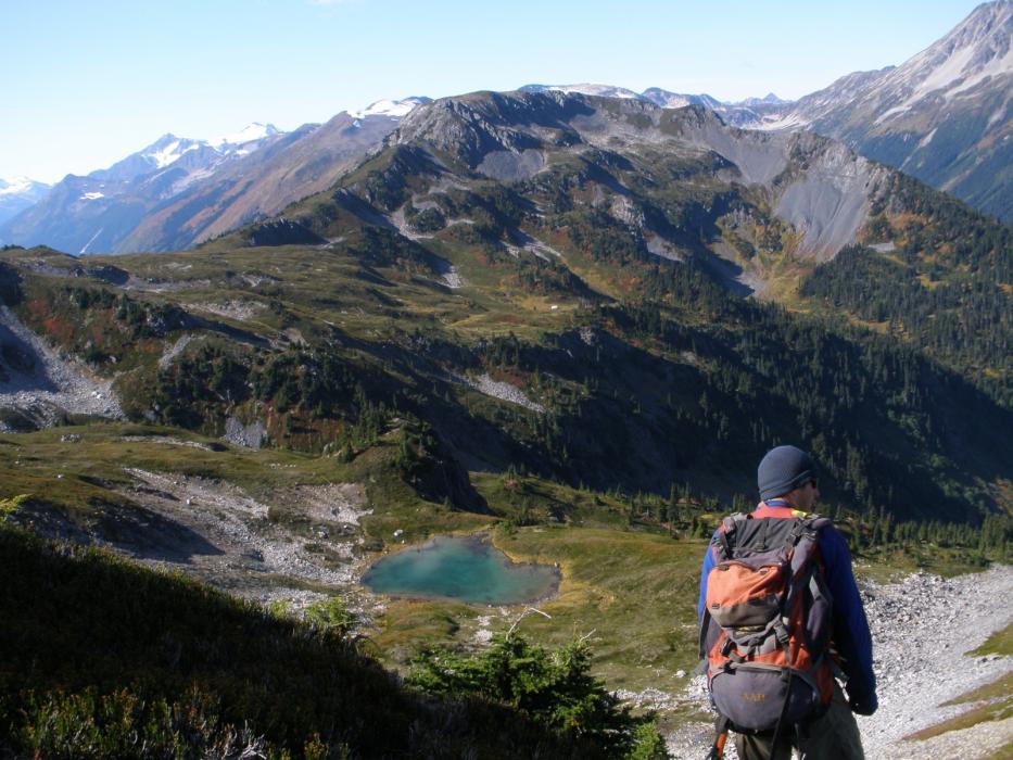 Geological Crew Memeber Overlooking the Exploration Camp the West Cu-Au Zone of the Elsiar Property in Northwestern British Columbia