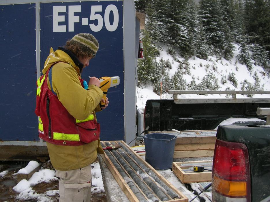 Geologist inspecting core during the 2009 drill program at the Sphinx Molybdenum Project in Southeastern British Columbia