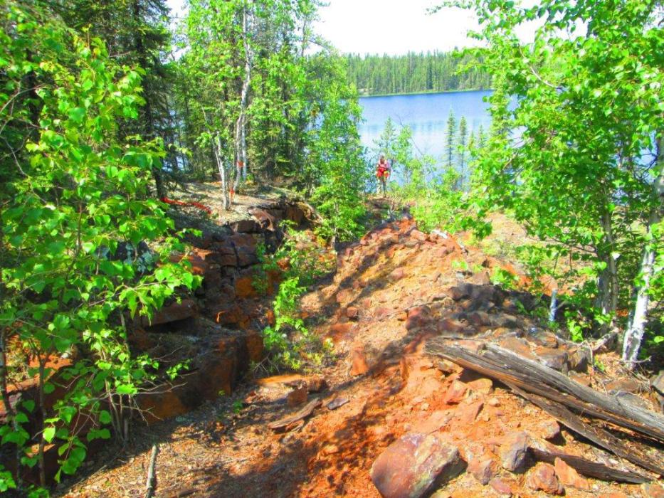 A rusty outcrop exposed at a uranium exploration project in Northern Saskatchewan